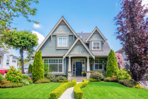 House with beautiful landscaping and siding