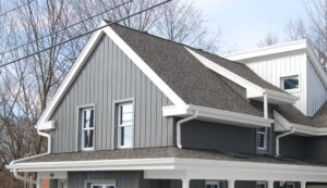 Upper level of a home with dark steel siding