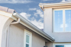 Seamless gutters on a two-story home