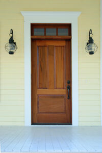 Front door and lanterns of a home home lanterns