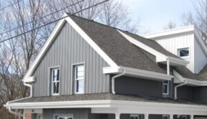 grey steel siding on two story home
